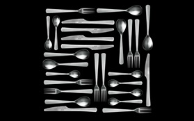 Normann Cutlery all pieces pattern on black background